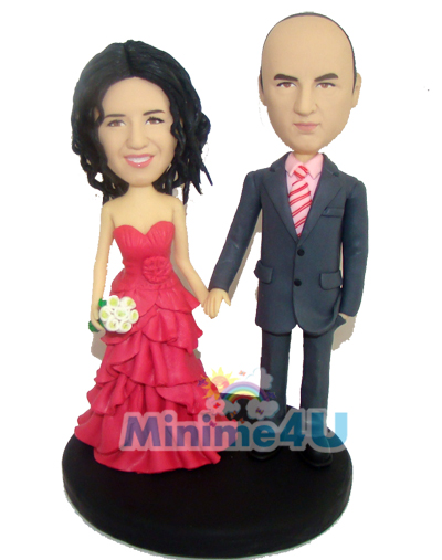 Wedding cake topper with colourful dresses